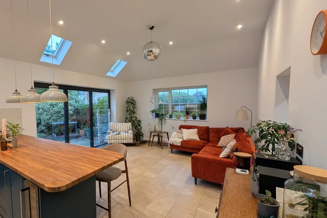 Seating area and kitchen island beneath the extension rooflights