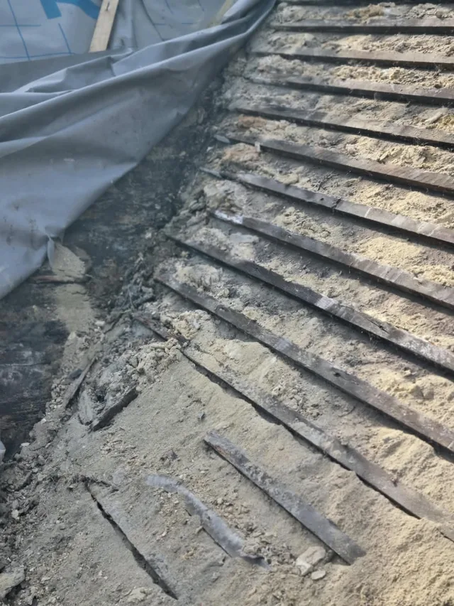 Existing battens exposed where the roof tiles have been removed