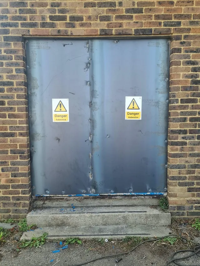 Steel plates securing an opening in a brick building
